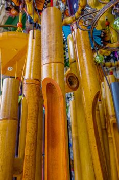 wooden and other wind chimes on display