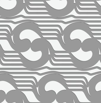 Perforated abstract swirly waves