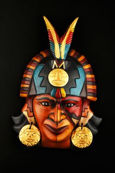 Indian Mayan Aztec ceramic mask isolated on black