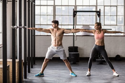 Two fit people doing fitness