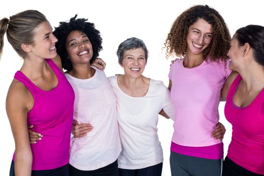 Smiling women with arms around 