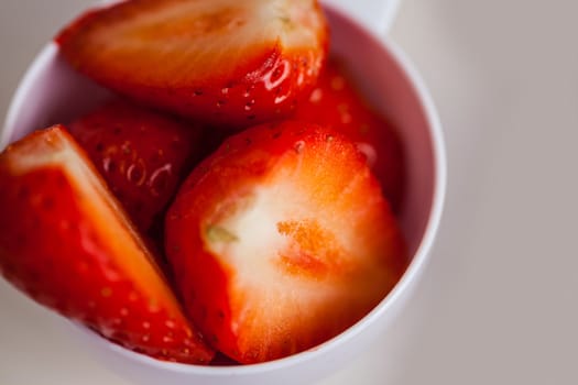 Portion cup of sliced strawberry