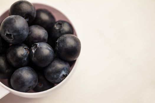 Portion cup of fresh blueberries