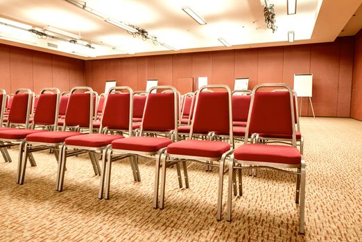 Empty chairs in modern conference room
