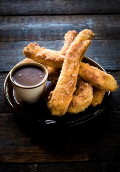 Sweet homemade churros and hot chocolate,selective focus
