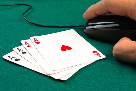 detail of poker card and mouse computer