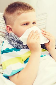 ill boy with flu at home