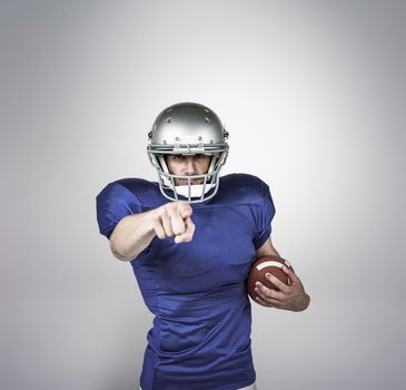 Composite image of portrait sports player pointing 