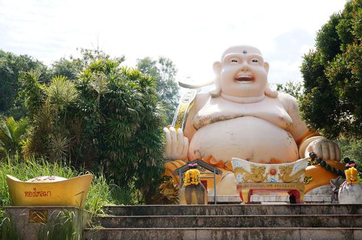 Standing Buddha Temple with Fat Laughing Buddha