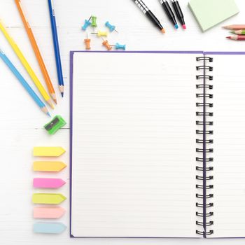 notepad with office supplies