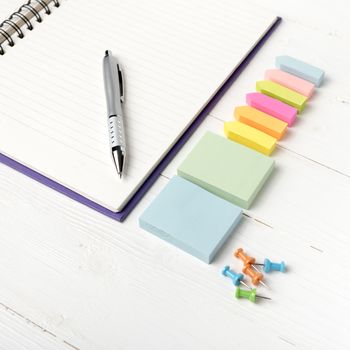 notepad with office supplies