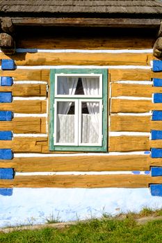 Detail view of old traditional colorful wooden house and window,