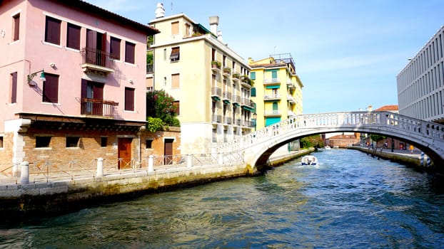 canal and bridge with ancient buildings