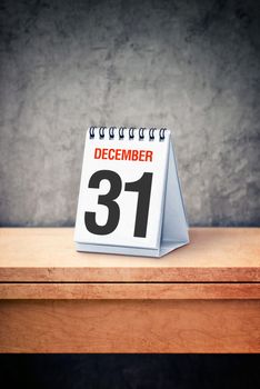 December the 31st on desk calendar at office table