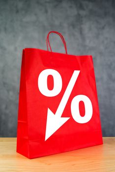 Discount Percentage Symbol on Red Shopping Bag