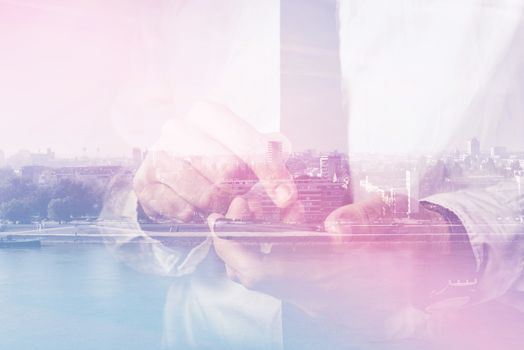 Double exposure of businessman hands with mobile smart phone