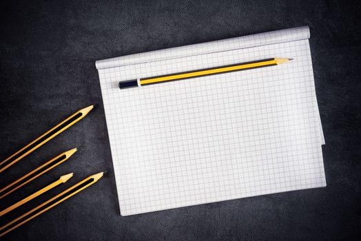 Pencils And Blank Notepad Page