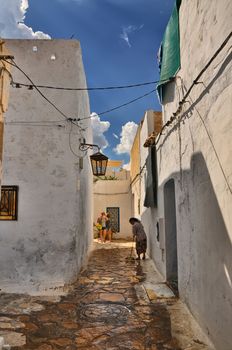 HAMMAMET, TUNISIA - OCT 2014: Narrow street of ancient Medina on