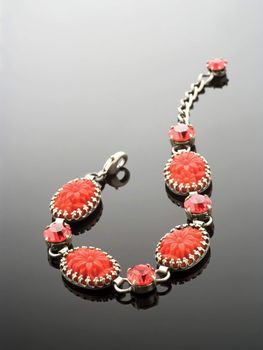 Bracelet with red gemstones