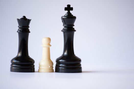White pawn on a black monarchy