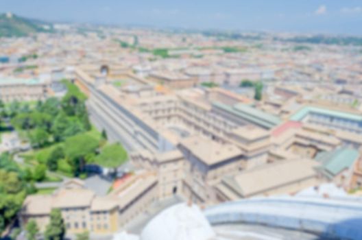 Defocused background with aerial view of Vatican Museums and Rom