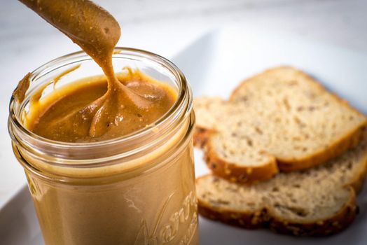 jar of fresh homemade peanut butter spread