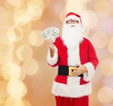 man in costume of santa claus with dollar money