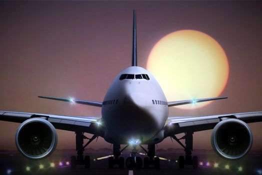 Airplane on runaway during sunset