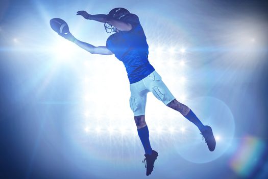 Composite image of sports player catching ball