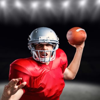 Composite image of portrait of american football player throwing ball