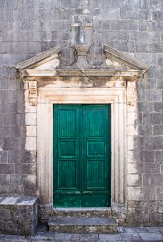 Green doors in Perast old town 
