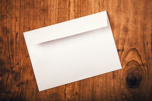 Blank mailing envelope on top of work desk