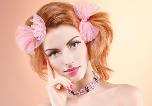 Beauty portrait nude woman smiling, eyelashes, perfect skin, natural makeup, fashion. Sensual attractive redhead sexy model girl with bow on pink, shiny straight hair.People face closeup,spa,copyspace