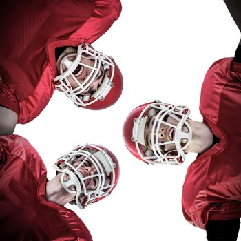 Composite image of american football huddle