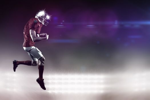 Composite image of american football player holding ball while running