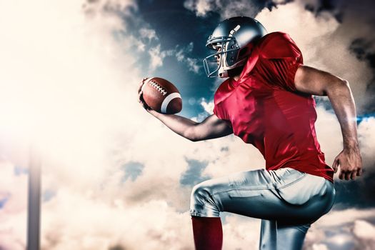 Composite image of side view of american football player running while holding ball