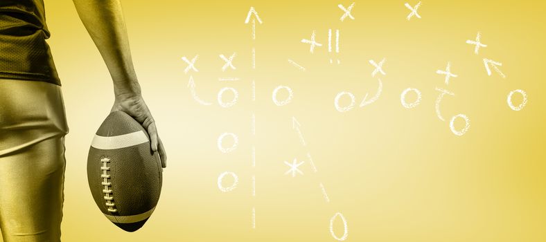 Composite image of cropped image of american football player holding ball