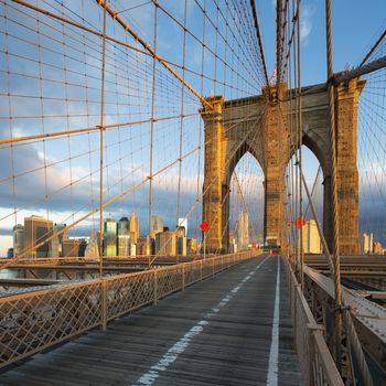 New York City Brooklyn Bridge in Manhattan and city skyline over Hudson River.