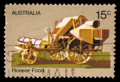 Stamp printed by Australia honoring Australian Pioneer Life shows Horse thresher
