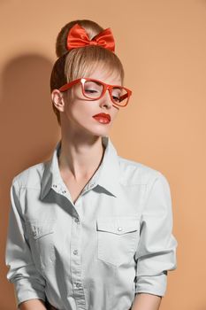 Beauty fashion nerdy woman thinking, glasses.Pinup