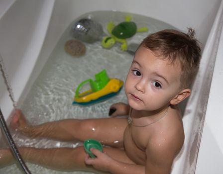 pretty young Boy in bath
