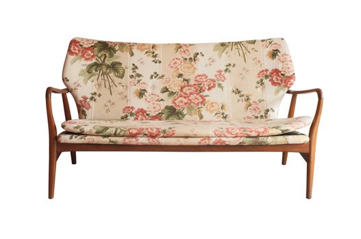 Wooden sofa upholstered in floral fabric printed, vintage style