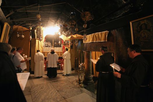 Procession from the church of St. Catherine and go to the cave in the Basilica of the Birth of Jesus, Bethlehem, Israel