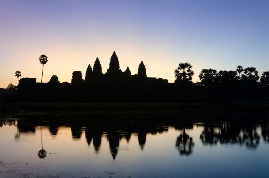 Silhouette of Angkor Wat temple at twilight
