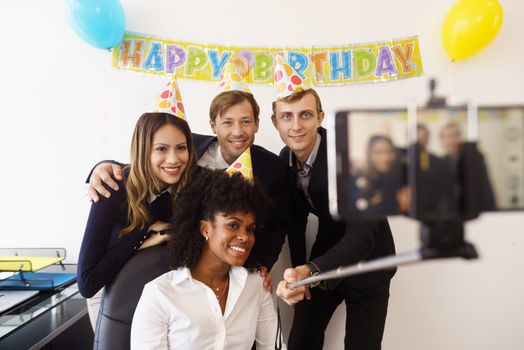 Business People Taking Selfie With Phone At Office Party