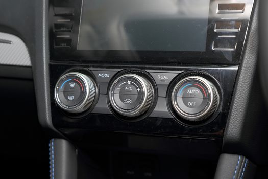 Air conditioning control, control Panel In interior in sport car.