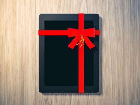 tablet wrapped with color ribbon