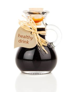maple syrup in glass bottle or herbal syrup, ardent drink, mixtu