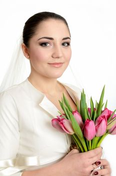 Happy bride with veil and tulips
