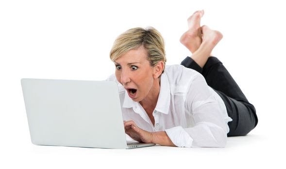 woman manager sat on the floor with laptop